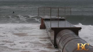 Surfer in distress and rescuer both die in stormy weather in Australia
