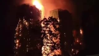 AT LEAST 13 PEOPLE ARE DEAD IN MAJOR FIRE AT WANG FUK COURT IN TAI PO HONG KONG