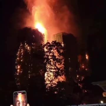 AT LEAST 13 PEOPLE ARE DEAD IN MAJOR FIRE AT WANG FUK COURT IN TAI PO HONG KONG