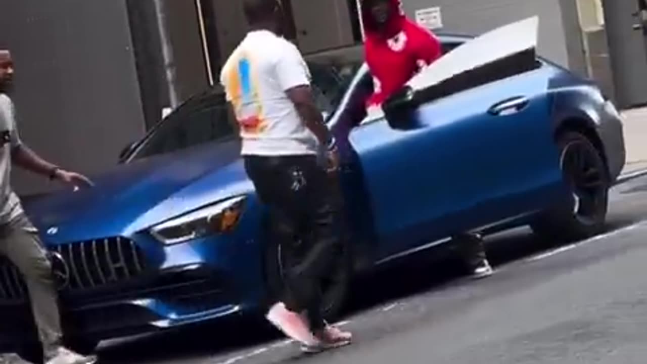 Viral NYC Moment: Man Grabs Another Man’s Face in Heated Street Exchange”