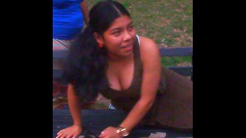 Luodong Massages Mexican Woman In Brown Shirt On The Park Bench