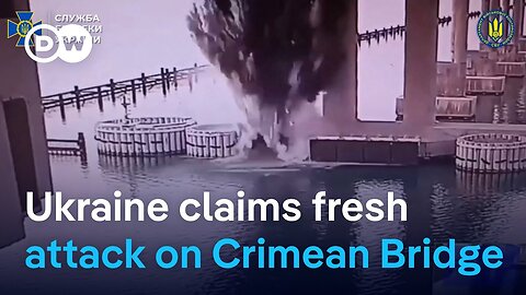 Ukraine says it hit Russia's bridge to Crimea with underwater bombs | DW News