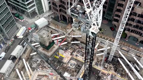 Medieval church lifted 46 feet to make way for London office build