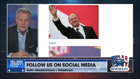 AfD politician Petr Bystron tells WarRoom of €11,000 fine for tweeting Angela Merkel’s “Nazi” salute