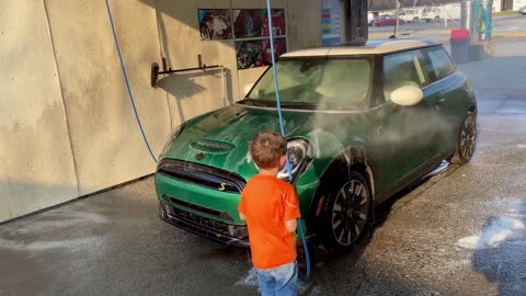 Kid Hoses Dad in the Face at Car Wash