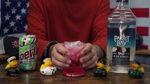 Phillip Crockett - Parrot Bay Coconut Rum 90 Proof & Mtn Dew Dragon Berry Soda