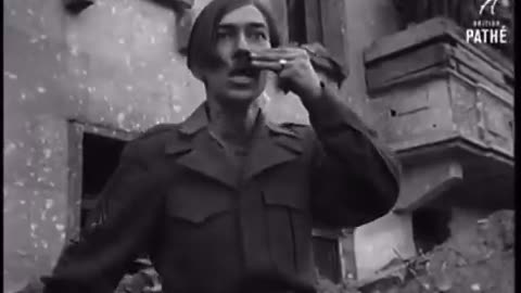 British soldiers mock Adolf Hitler after his suicide, May 2, 1945