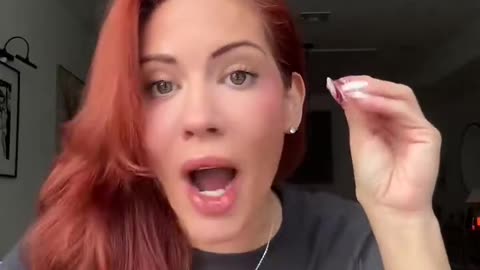 Feminist woman has PERMA BIRD HANDS lol