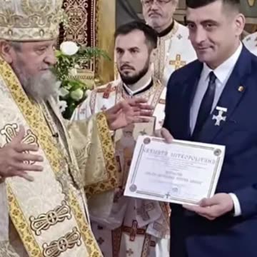 Ereticul Ecumenist George Simion primeste crucea Saguniana de la Ereticul Ecumenist Laurentiu Streza