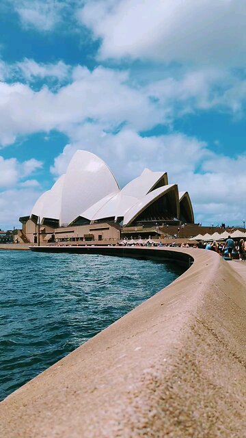 Sydney opera house under the cloud sky