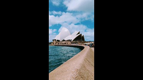 Sydney opera house under the cloud sky