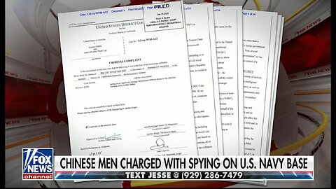 CHINESE MEN CHARGED WITH SPYING ON U.S. NAVY BASE