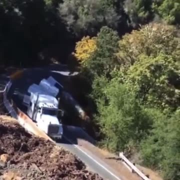 Trucker in California attempts tight turn, falls down side of mountain