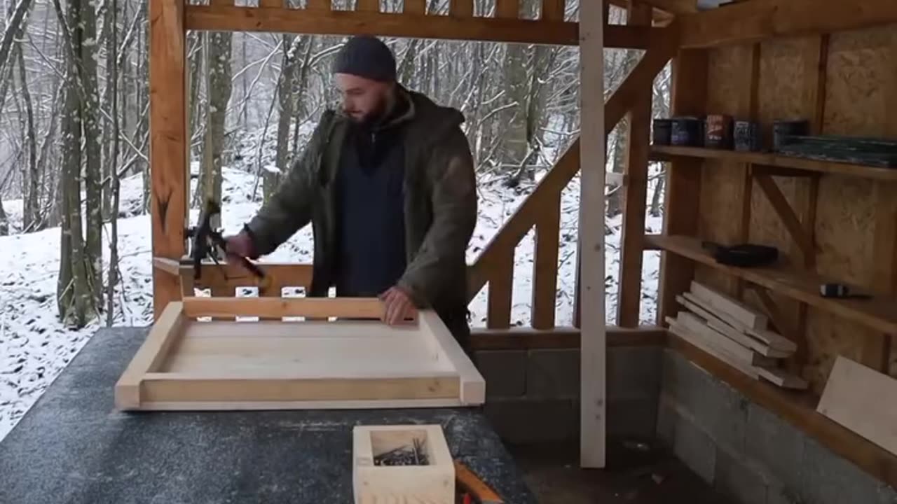 Construction of a wooden house in the forest