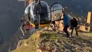 This gorgeous torque turn: He pulled in collective to climb, pushed the cyclic to the right