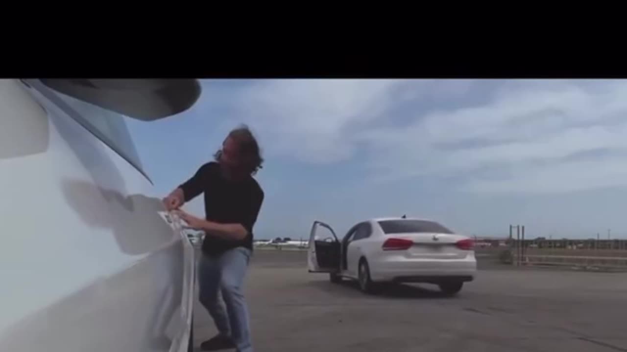 Idiot fails to put his car in park, assaults Tesla, rubs naked bum, then chases HIS car