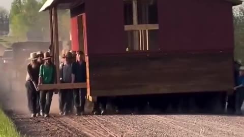 50 Amish Men and Boys Move a Barn Over a Mile on a Dirt Road in Pennsylvania