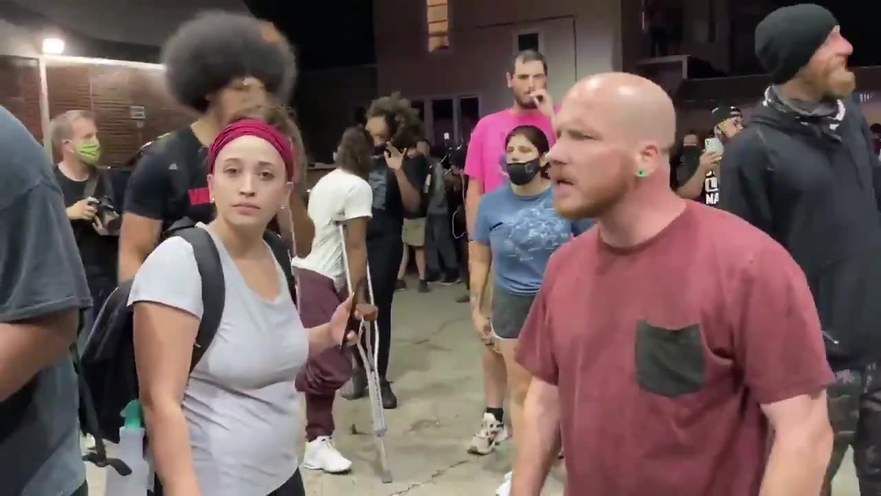 2020 Kenosha. Joseph Rosenbaum early in evening wearing faded red t shirt