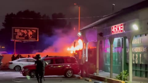 Anti-ICE rioters start fire next to a business as they continue to clash with authorities in L.A.