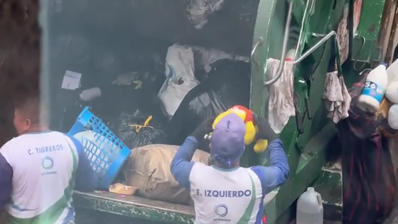Garbage Men Save Teddy Bear From the Trash