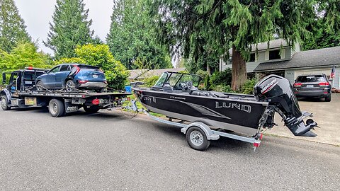 2 Suv's, a Boat on a trailer and a 920lb Harley