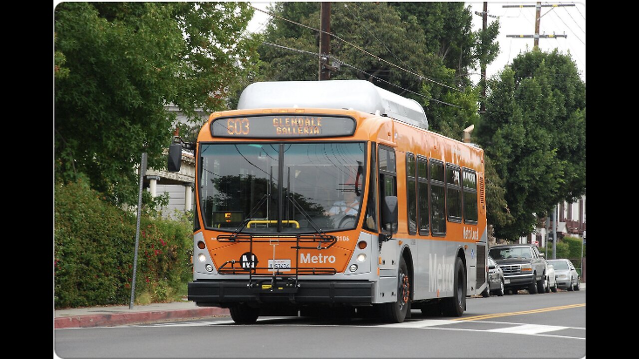 LA Metro Bus Metro NABI 31LFW bus on West 23rd Street in University Park, Los Angeles.