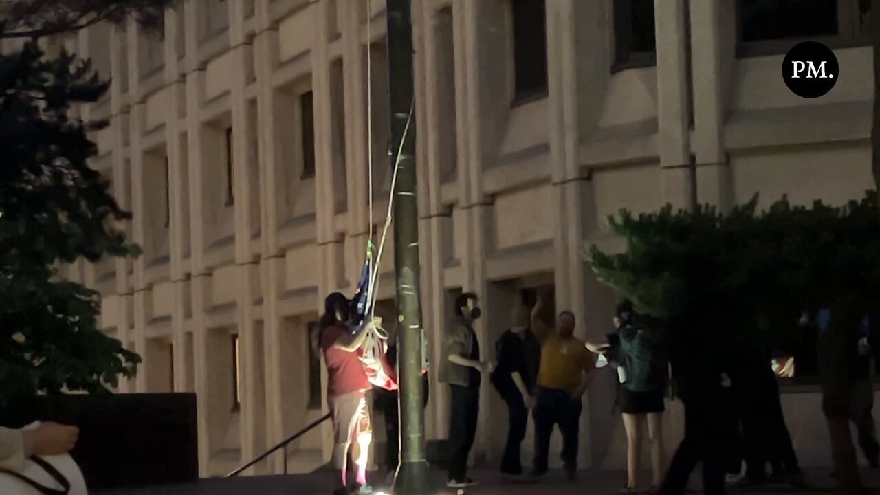 Antifa militants and anti-ICE activists have torn down the American flag at the federal building in Seattle.