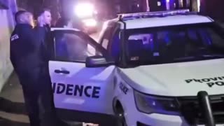 Police arrested a suspect at Brown University, while people nearby asked,