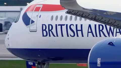 In the frame of a spotter filming the landing of a British Airways Airbus A350