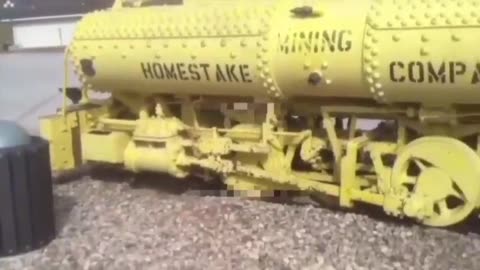A COMPRESSED-AIR POWERED LOCOMOTIVE