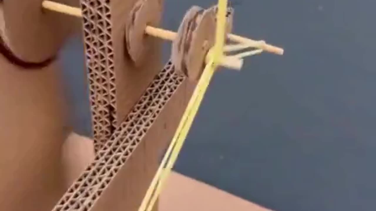 Wow! A windmill made from cardboard paper? 🎨✨ The creativity here is amazing! 🌀🖐️