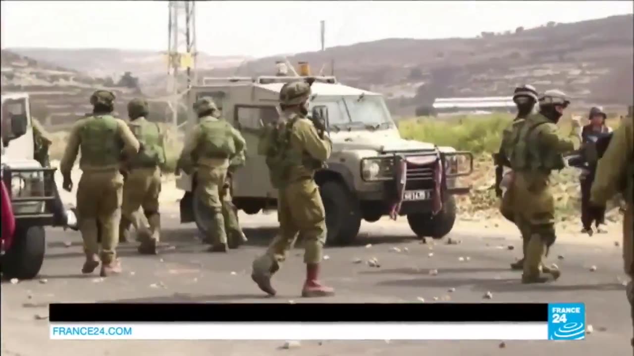 Duvdevan in action among the crowd of Palestinian protesters