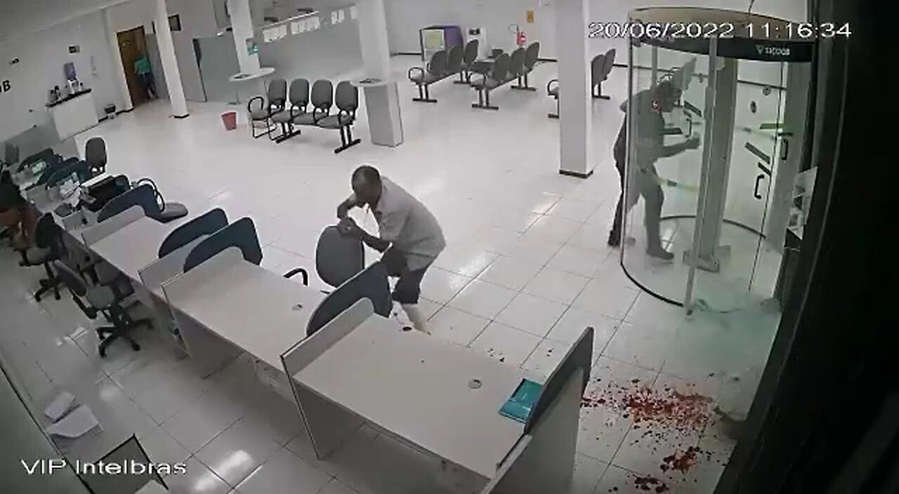 Dude Comes In an Shoots Bank Security Guard