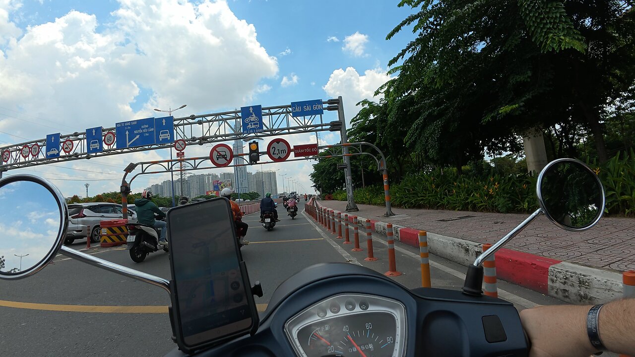 Driving across the Saigon bridge