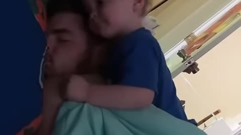 When you want to snuggle with dad but food is life babies view #babiesview