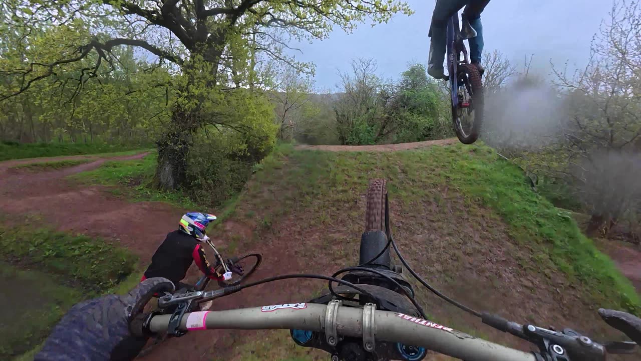 Two Mountain Bikers Nearly Land on Each Other