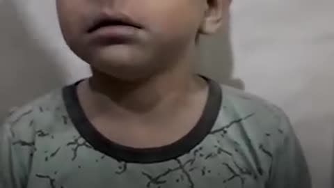 Palestinian child in shock after surviving attack in Gaza