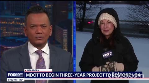 Broken pipe floods Detroit building, street