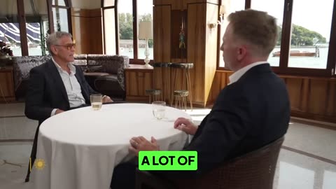 George Clooney holds back visible frustration when asked a question about Hunter Biden.