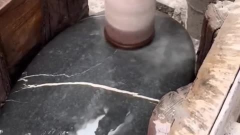 Watch as artisans transform raw marble into an elegant