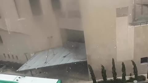 CRAZY RAIN in Jerusalem this morning overlooking the Old City walls