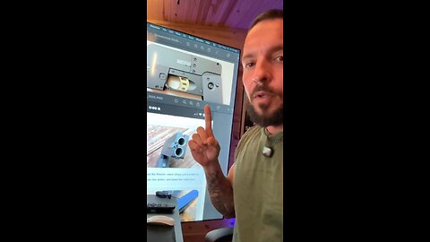 The Man On Stage With CK Was Holding A Cell Phone Pistol