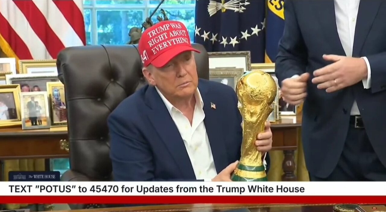 LOL. Trump Holding The FIFA World Cup Trophy: Can I Keep It?