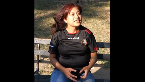 Luodong Massages Mexican Woman In Black Shirt On The Park Bench