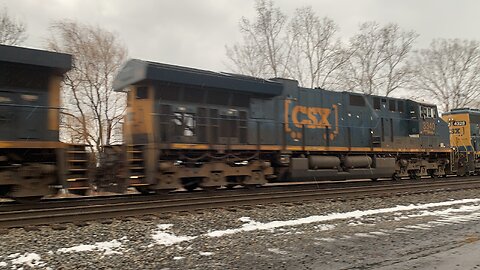3 CSX Train engines and a geep