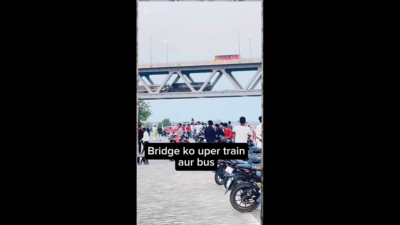 Train and bus over bridge