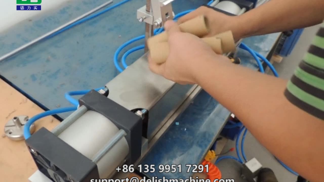 DELISH paper tube punching machine, instead of manual drilling.