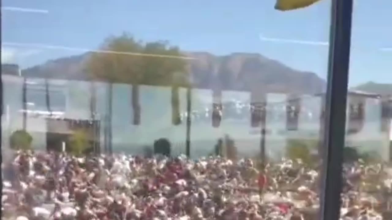 Additional footage shows an individual running across the roof of the Losee Center