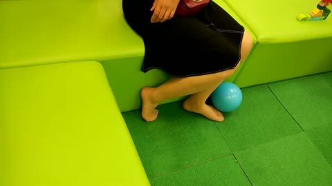 At the indoor playground...