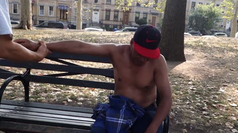 Luodong Massages Hispanic Construction Worker On The Park Bench